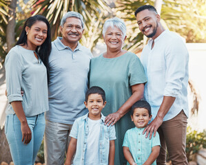 Wall Mural - Big family, children and garden portrait with outdoor wellness, love and hug for summer, holiday and retirement. Grandparents, happy couple and kids in Mexico with smile on face in nature or park