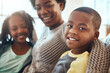 © Reese/peopleimages.com - Love, portrait of mother and children bonding on sofa for happy family time together in apartment in South Africa. Smile, trust and support, black woman and kids on couch with healthy relationship.