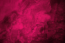 Black Red Rough Surface. Toned Old Concrete Wall.  Viva Magenta Color. Trend 2023. Close-up. Grunge Background For Design. Distressed, Cracked, Broken, Crumbled, Damaged, Dilapidated. Backdrop.
