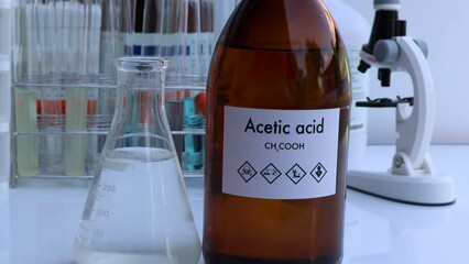 Wall Mural - Acetic acid in bottle , chemical in the laboratory and industry