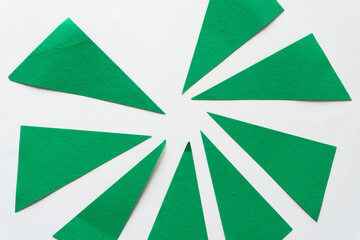 Poster - green paper triangles on white background