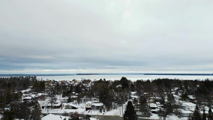 Wall Mural - Innisfil  lake simcoe winter time frozen lake cloudy day 