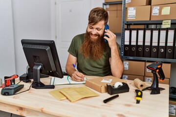 Sticker - Young redhead man business worker talking on the smartphone at office