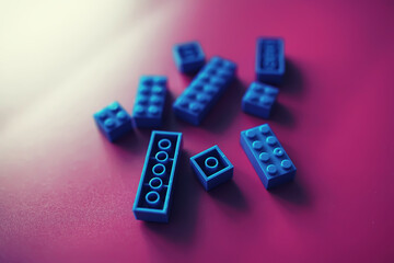 A scattering of constructor elements for children. Colored blue bricks from the puzzle.