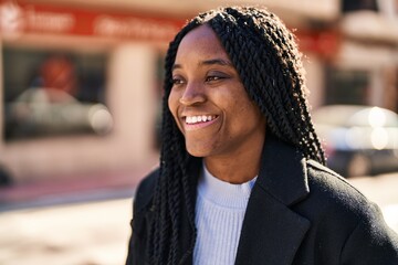 Sticker - African american woman smiling confident looking to the side at street