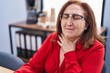 © Krakenimages.com - Senior woman business worker suffering for throat pain at office