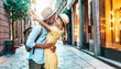© Davide Angelini - Couple of lovers kissing on city street - Two tourists enjoying romantic vacation together - Boyfriend and girlfriend dating outside - Love, tourism and life style concept