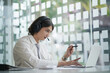 © Charlie's - Business man working with laptop. Young business man thinking Concentrated at work.