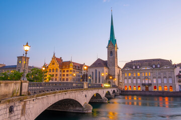 Wall Mural - Scenic panoramic view of historic Zürich city center with famous Fraumünster and Grossmünster Church and river Limmat at Lake Zurich on a beautiful sunny day with blue sky in summer, Switzerland