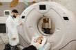 © Rabizo Anatolii - CT scanning of the brains examination to assess head injuries, severe headaches, dizziness, bleeding and stroke, brain tumors Computed tomography CT scan process for examination brains