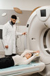© Rabizo Anatolii - CT scan of abdomen of girl in medical clinic. Woman patient is doing computed tomography x-ray scan chest examination of abdominal in a CT scan room.