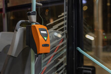 Orange Ticket Validator As Used In Public Transport In The City Of Prague On A City Tram.