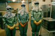 © Cavan Images - People dressed in sterile suits, Barcelona, Spain.