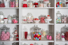 Display Shelves Stocked With Jars Of Valentine Candy And Hearts