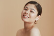 © Alliance - Portrait of modern asian female looking in camera