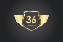 36 Years Anniversary Logotype 3D Golden Stylized Modern Shape Winged Shield On Black Background
