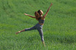 © Antonioguillem - Woman danding in a field