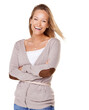 © peopleimages.com - Portrait of a lovely young woman smiling at the camera with her arms folded isolated on a PNG background.