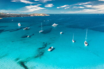 Canvas Print - Aerial view of luxury yacht on blue sea in summer. Top view from drone. Beautiful seascape