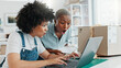 © Nicholas F/peopleimages.com - Surprised, shocked and excited women looking amazed and showing happy expression sitting in their office. Two black professional entrepreneurs celebrating and cheering their new ecommerce business st