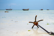 A Boat Anchor On The Beach In Zanzibar, Tanzania.
