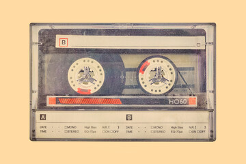 Wall Mural - retro styled image of a vintage audio compact cassette in a plastic storage box