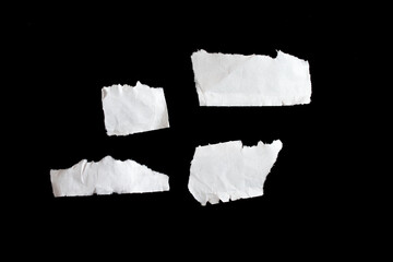 Fototapete - Set of torn paper piece isolated on black background