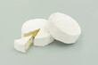 © pasha - white cheese on a gray background