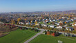 Large soccer fields near upscale residential neighborhood in Monroe County with downtown Rochester, Upstate New York in background