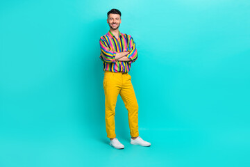 Sticker - Full size photo of handsome nice satisfied guy brunet haircut wear colorful shirt standing arms crossed isolated on teal color background