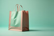 A brown shopping paper bag without logo on surface, isolated place on pastel green background. Generative Ai image.