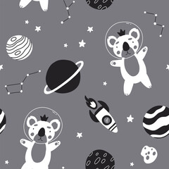 Wall Mural - Seamless monochrome childish pattern with astronaut koala, planet, stars and constellation. Creative scandinavian kids texture for fabric, wrapping, textile, wallpaper, apparel.