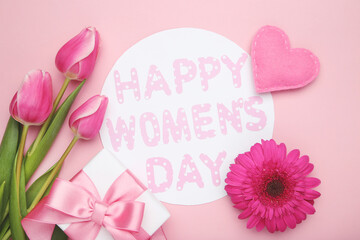 Wall Mural - Gerbera and tulips flowers, felt heart, gift and roundcard with text 8 Happy Women's Day on pink background