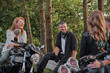 © perfectlab - A company of friends travel together on motorcycles, stopped at the roadside, have fun and drink tea