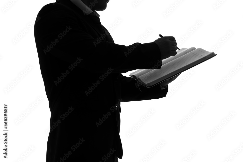 Silhouette of businessman writing in notebook on white background