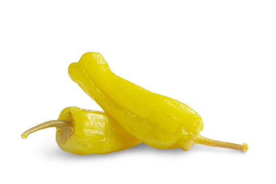 Two pickled yellow peppers, pepperoncini or friggitelli isolated on transparent background, PNG. Hot pepper marinated, brined. Traditional Italian and greek cuisine, ingredient for salad, pasta, sauce