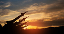 The Missiles Are Aimed To The Sky At Sunset. Nuclear Bomb, Chemical Weapons, Missile Defense, A System Of Salvo Fire.