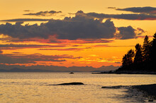 Sunshine Coast Canada Orange Sunset. Roberts Creek Beach At Sunset On The Sunshine Coast Near Sechelt. BC, Canada. 

