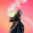 © Danilo - Astronaut with helmet smoking in profile with pastel colors with a small rainbow in the background, with gradient color in the background. Surreal image. Surrealism.