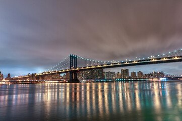 Sticker - Manhattan Bridge at Night. Long Exposure. New York. NYC, USA. Lights Reflection on Water.