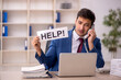 © Elnur - Young male employee asking for help in the office