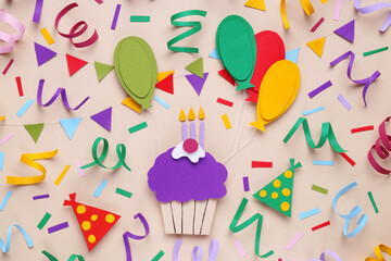 Sticker - Birthday party. Paper cupcake and confetti on beige background, flat lay