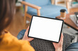 © sitthiphong - Hand holding digital tablet mockup of blank screen. Take your screen to put on advertising.