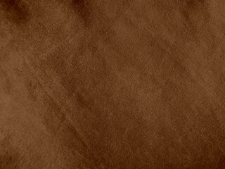 Brown color velvet fabric texture used as background. Empty brown fabric background of soft and smooth textile material. There is space for text..