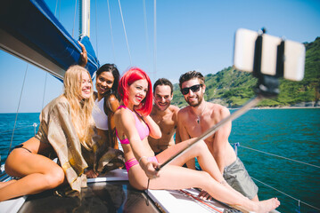 Wall Mural - fiends having fun on a sail boat