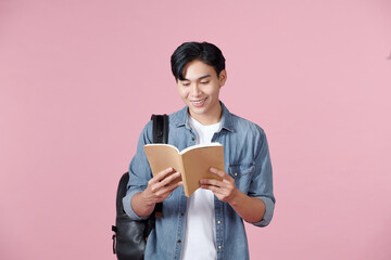 student with open book at school