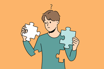 Frustrated young man with jigsaw puzzles in hands rebuild personality. Concept of mental and psychological disorder. Psychology treatment and recovery. Vector illustration. 