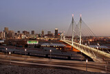 Fototapeta Sawanna - nelson mandela bridge Johannesburg skyline dusk dawn