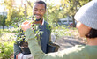 © N Felix/peopleimages.com - Plant, sustainability and people in a garden happy for agriculture and growth in the environment. Volunteer, black man and farmer excited for planting as in a park or nature for charity