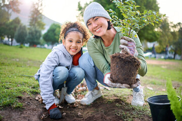 Family portrait, plant and gardening in a park with trees in nature environment, agriculture or garden. Happy volunteer woman and child planting for growth, ecology and sustainability of community